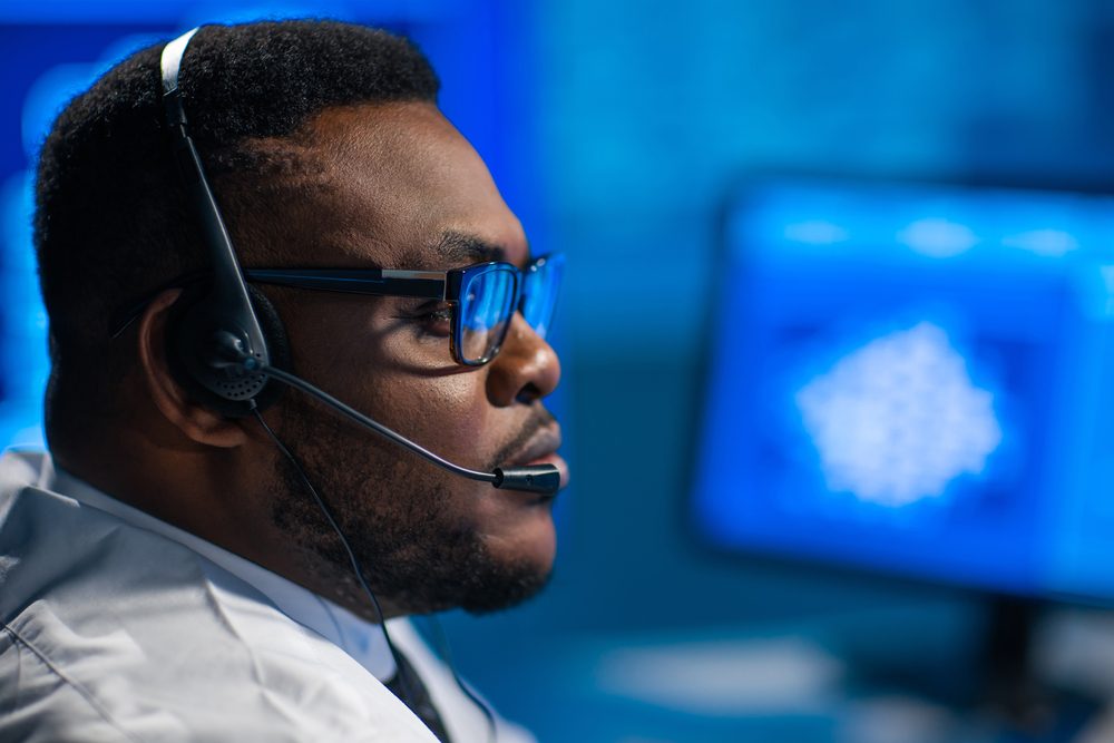 Technical support specialist wearing a headset